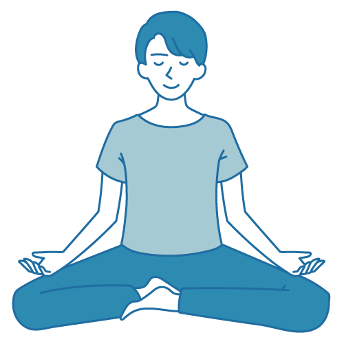 オフィスワーカーがデスクでマインドフルネス瞑想をしてリラックスしている様子